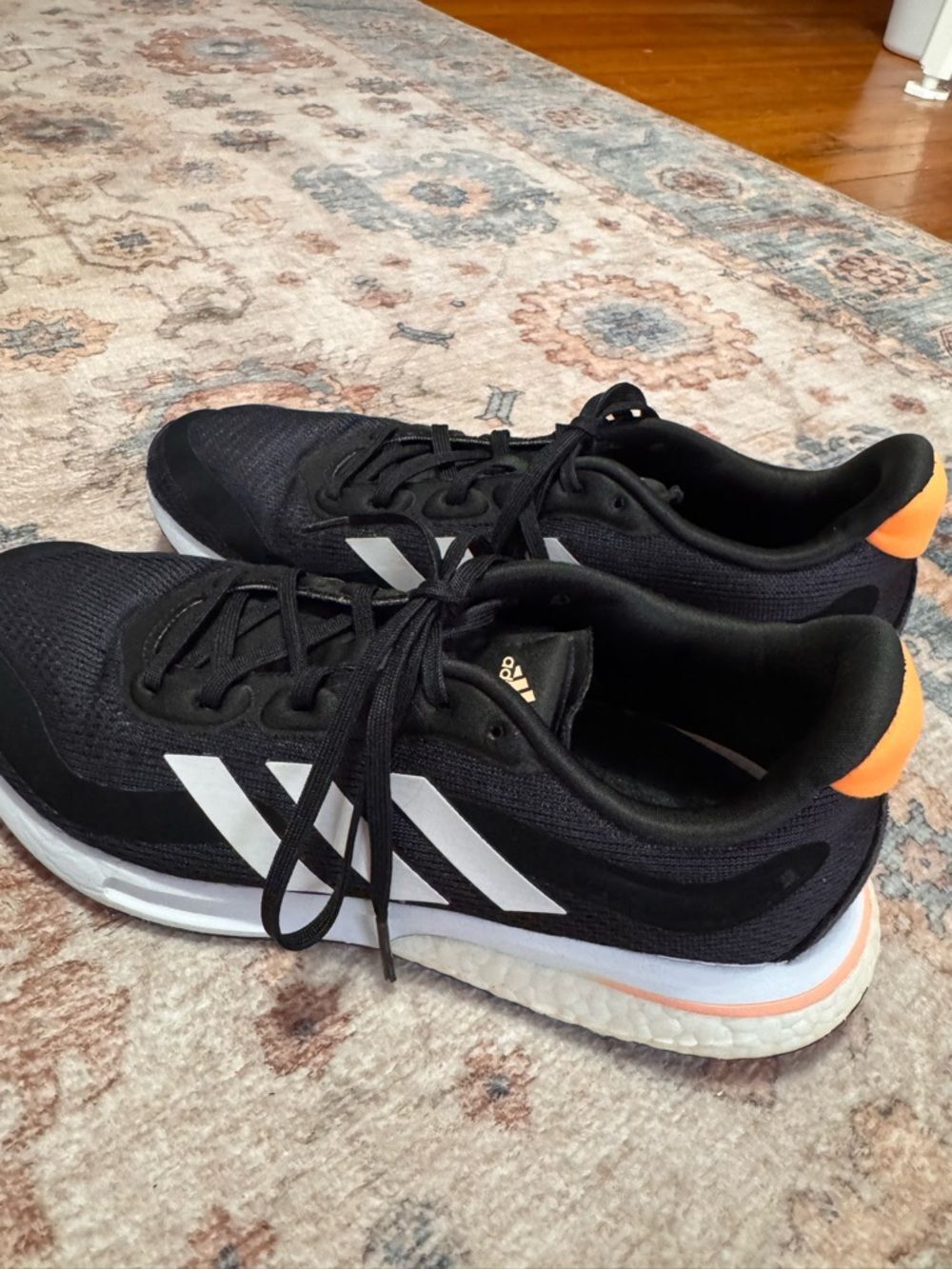 adidas Black Sneakers with White Stripes and Orange Heel Tab
